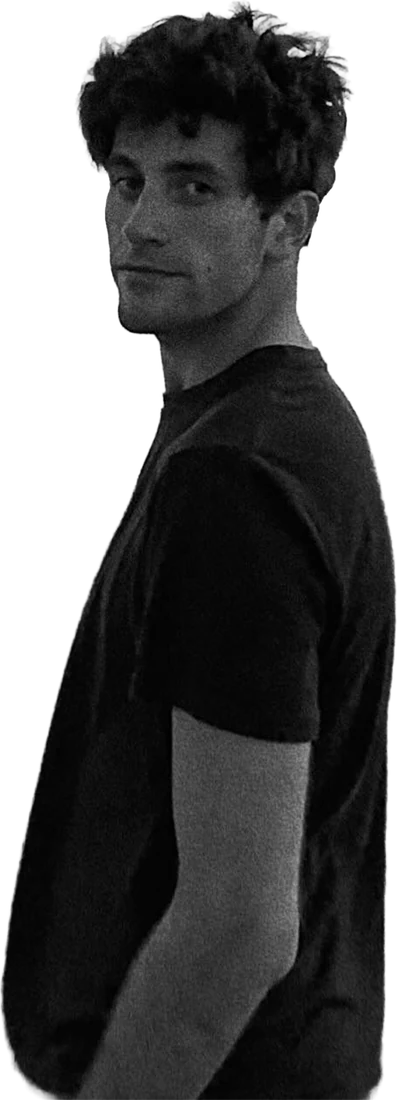 Black and white cutout of Nick looking over his shoulder